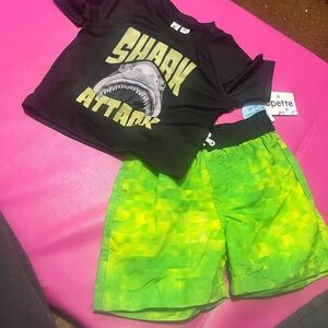 Wippette Black and Green Swim Trunks Vibrant Design